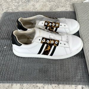 Good used condition, authentic Tory Burch sneakers. Cute leopard print design